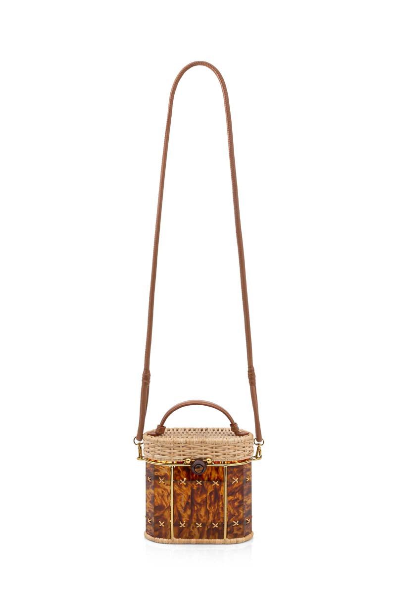 Waiwai Rio Copan turtle top handle bag in vibrant green with textured finish and sturdy handles.