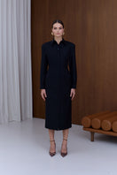 Undress Edith black wool midi dress featuring a fitted silhouette and long sleeves, displayed on a hanger.