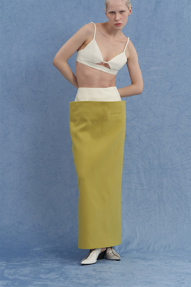 Green JINSUN tuxedo maxi pencil skirt shown on a model, featuring a sleek, fitted design perfect for elegant occasions.