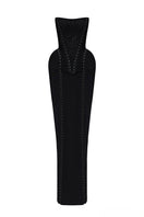 Black MUNA gown with hooks by BALYKINA, featuring elegant fabric and detailed design, suitable for formal occasions.