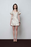 Do Long Rose Dot Mini Dress featuring a fitted silhouette with pink rose dot pattern and short sleeves.