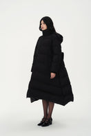 Chictopia LELA Down Coat in black, stylish winter coat with quilted design and hood for warmth and comfort.