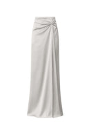 Nazlı Ceren Corinne satin maxi skirt in silver lining with smooth fabric and elegant flow, shown on a model.