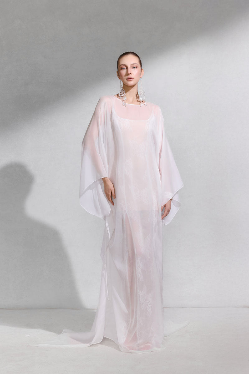 Arti Apparel GENUS Maxi Dress in flowing fabric, featuring a stylish design and elegant silhouette for versatile summer wear.