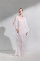Arti Apparel GENUS maxi dress featuring a flowing fabric and elegant design, perfect for casual or formal wear.