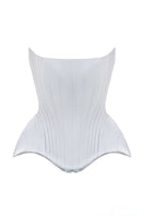 Light-blue Irma corset top by Balykina featuring structured design and adjustable straps, shown on a model.