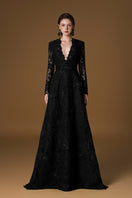 Black V-neck A-line lace gown with long sleeves by I.H.F, featuring intricate lace details and a flowing silhouette.