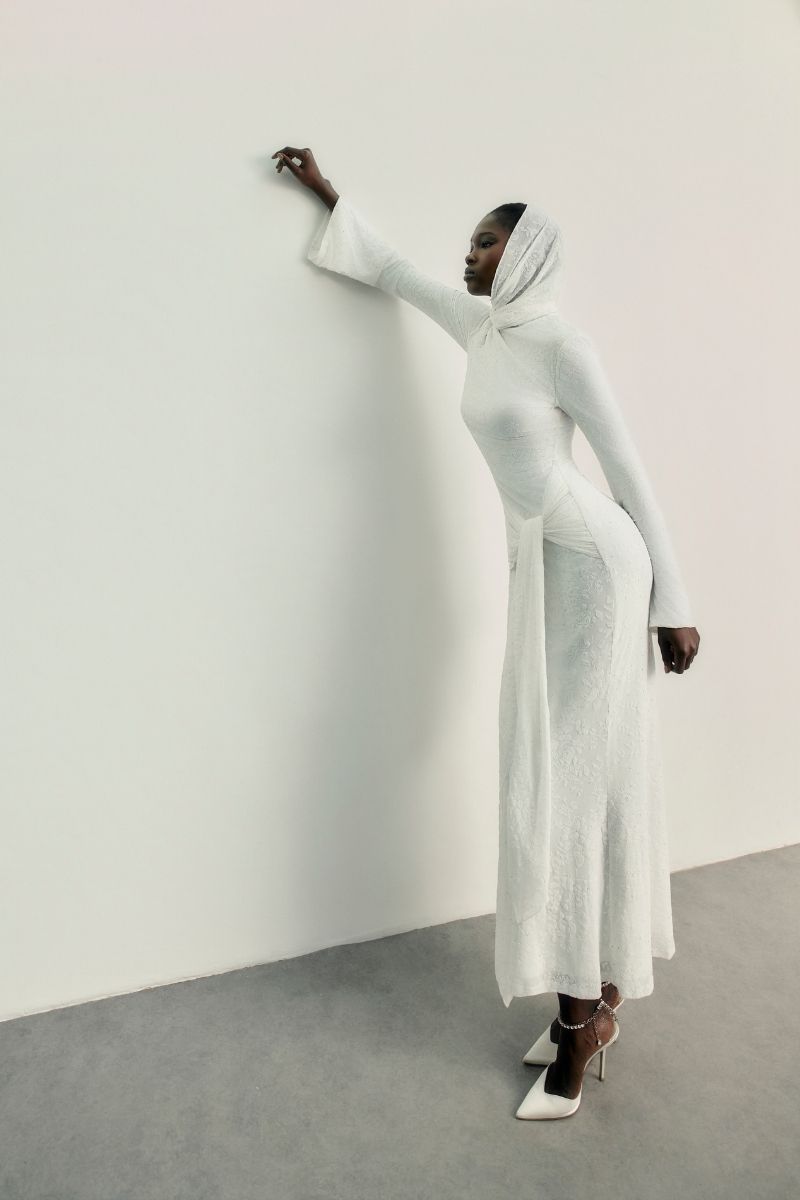 Khanum's Keli white maxi dress, flowing fabric and elegant design, perfect for summer or formal occasions.