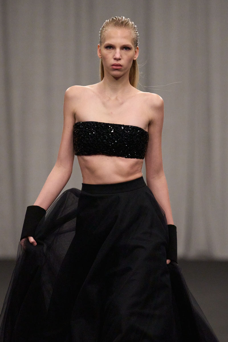 Lili Blanc crystal-embellished crop top and skirt co-ords set, featuring a stylish matching crop top with sparkling details and a coordinating skirt.