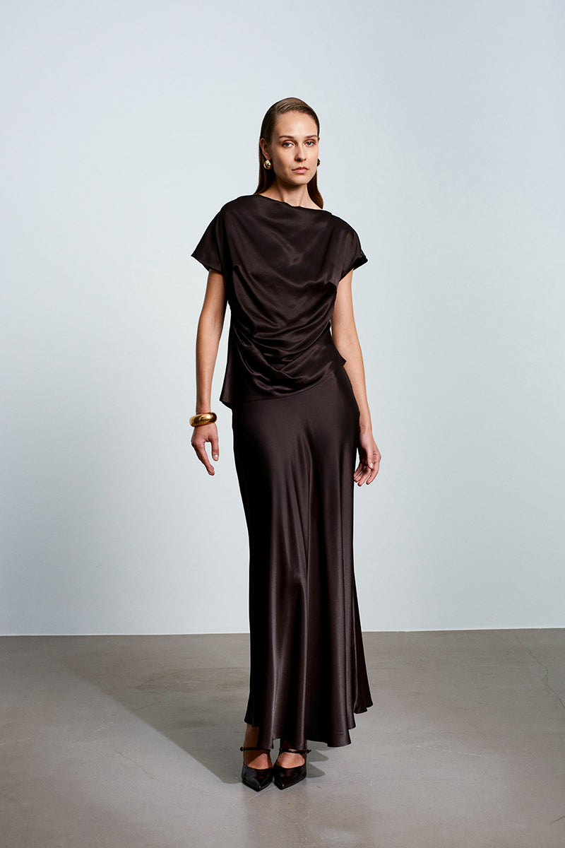 Brown Greek satin top by Acaria Studio featuring a smooth, shiny fabric and elegant design, shown styled on a model.