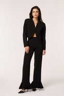 Señorita Eugenia black pants featuring a tailored fit and classic style, shown on a model with minimal accessories.