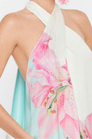 Valenciani Riviera halter maxi dress in multicolor with flowing fabric and vibrant pattern, displayed on a mannequin.