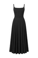 TONYY Noir Veil Maxi Dress displayed on a mannequin, featuring elegant black fabric and flowing silhouette for stylish occasions.