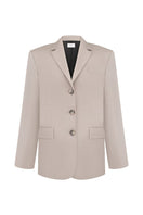 Elenareva taupe wool tailored jacket displayed on a hanger, showcasing its sleek design and structured fit.