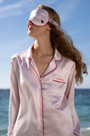 Pink Little Heart Eye Mask in loungewear by Not Just Pajama, featuring a cute heart eye design for relaxing comfort.