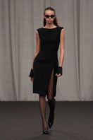 Lili Blanc modern sleeveless midi dress with a fitted waist and flowing skirt, stylish and perfect for summer occasions.