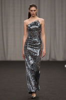 Lili Blanc asymmetric neckline sequin gown featuring a stylish design with shimmering sequins and elegant silhouette.