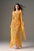 I.H.F Studio Cult Mia X floral garden orange lace maxi dress with a fitted column silhouette and floral print design.