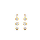 Peracas MINI BELLA earrings in white, small hoop earrings with a sleek, minimalist design, shown on a white background.