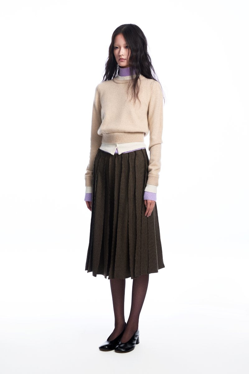 Beige layered cashmere sweater from Chictopia, featuring a cozy, stylish design with soft knit texture.