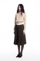 Beige layered cashmere sweater from Chictopia, featuring a cozy, stylish design with soft knit texture.