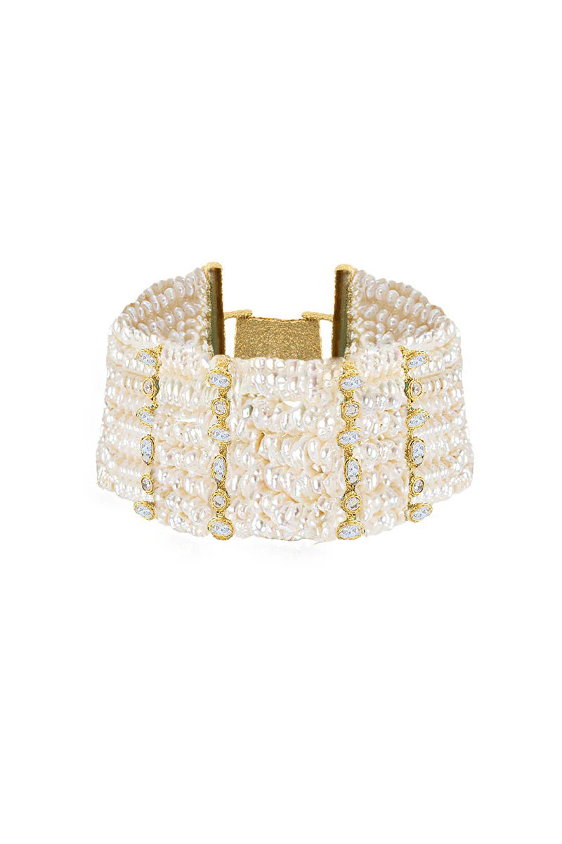 Peracas Patmos Waves Pearl Cuff in ivory, stylish bracelet with pearl accents, showcasing elegant design and modern jewelry craftsmanship.