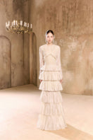 Elegant EMALY gown by Arti Apparel featuring a flowing fabric and intricate detailing, perfect for formal occasions.