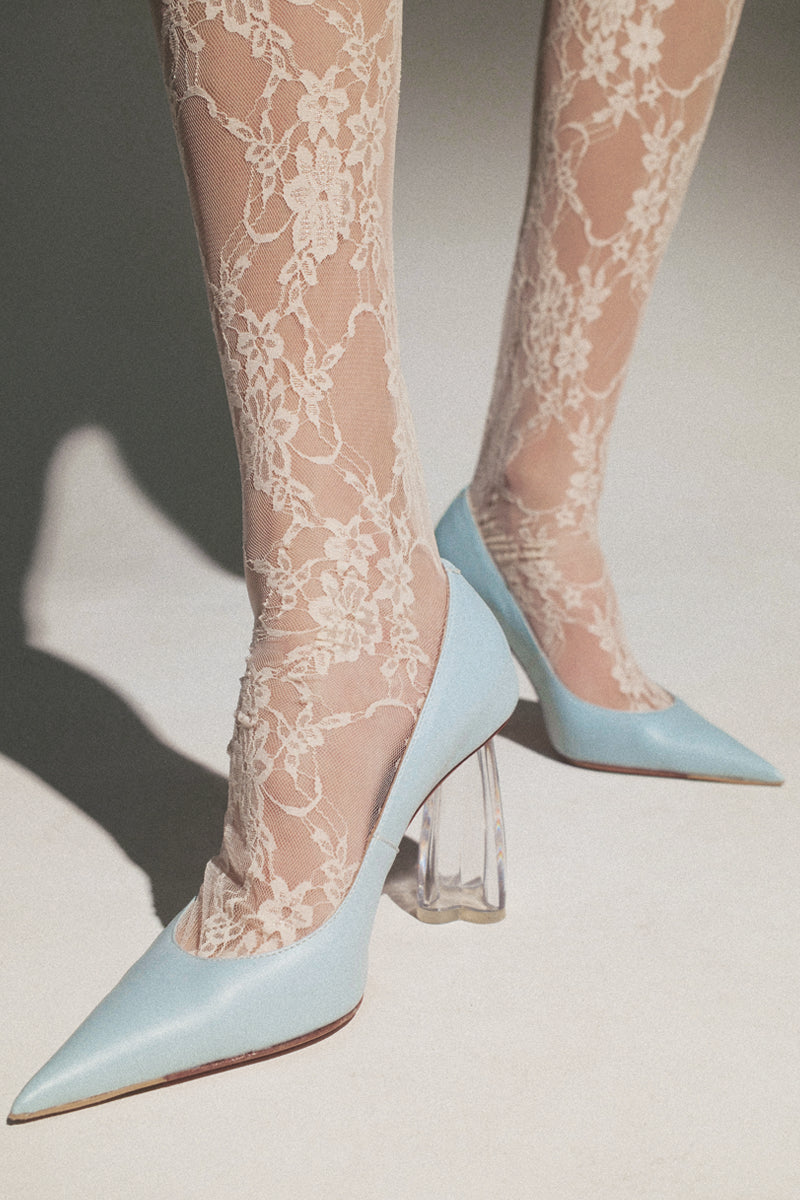 Blue Fiorellini glass pump heels by House of Atana, featuring clear glass design and elegant high heel silhouette.