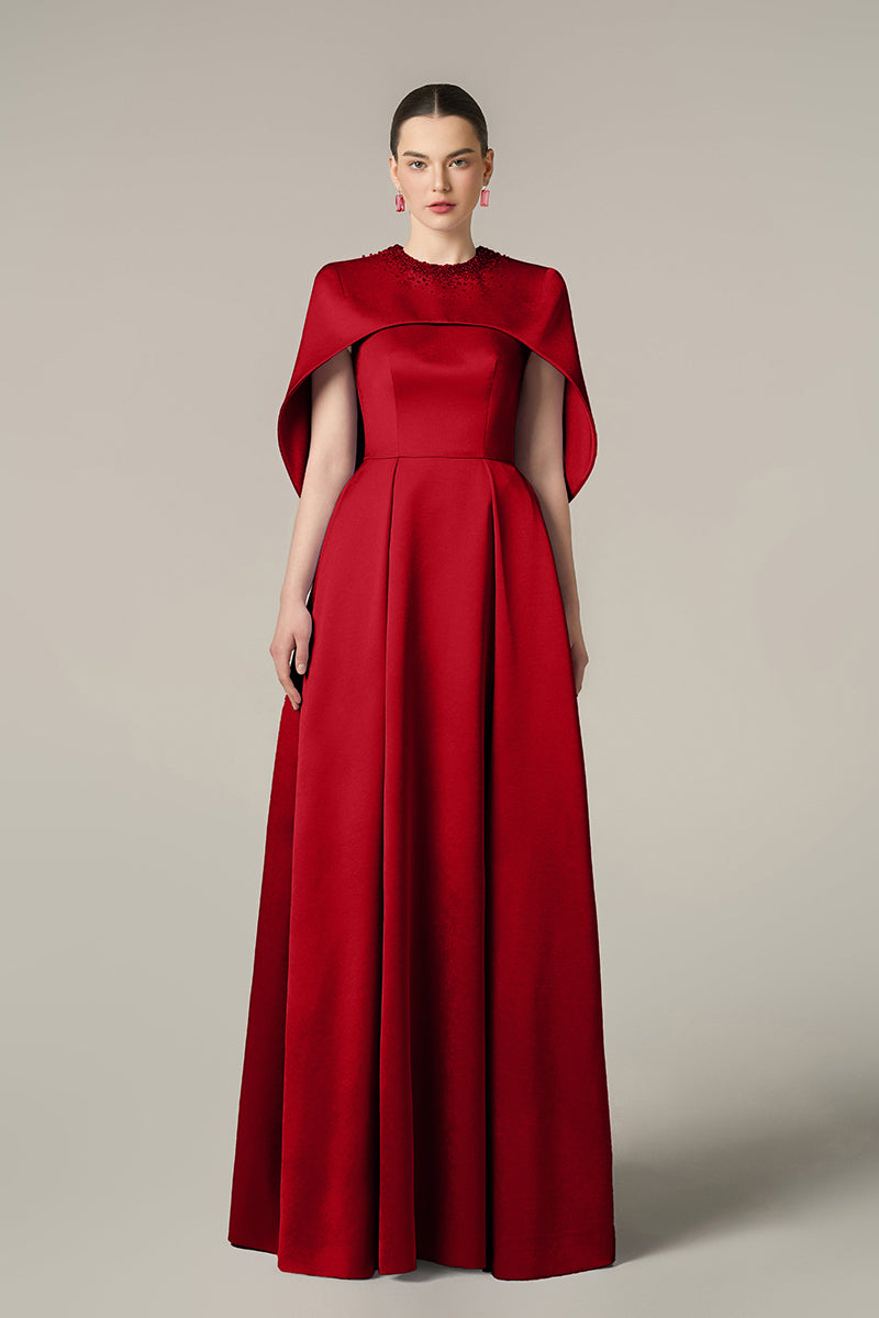 Red silk taffeta gown by I.H.F, featuring a flowing elegant design perfect for formal occasions.