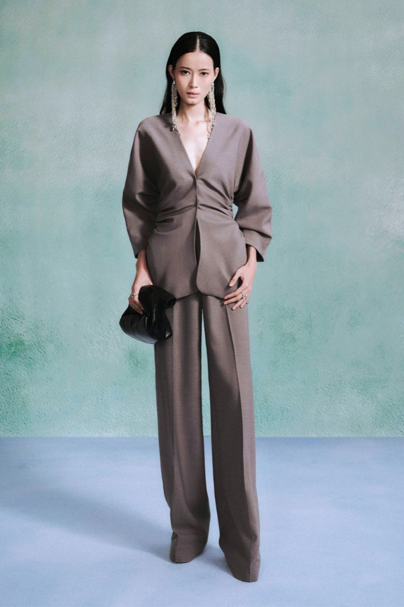 Gray Leacia long sleeve shirt with a fitted design, featuring a classic crew neckline and sleek fabric for a stylish look.