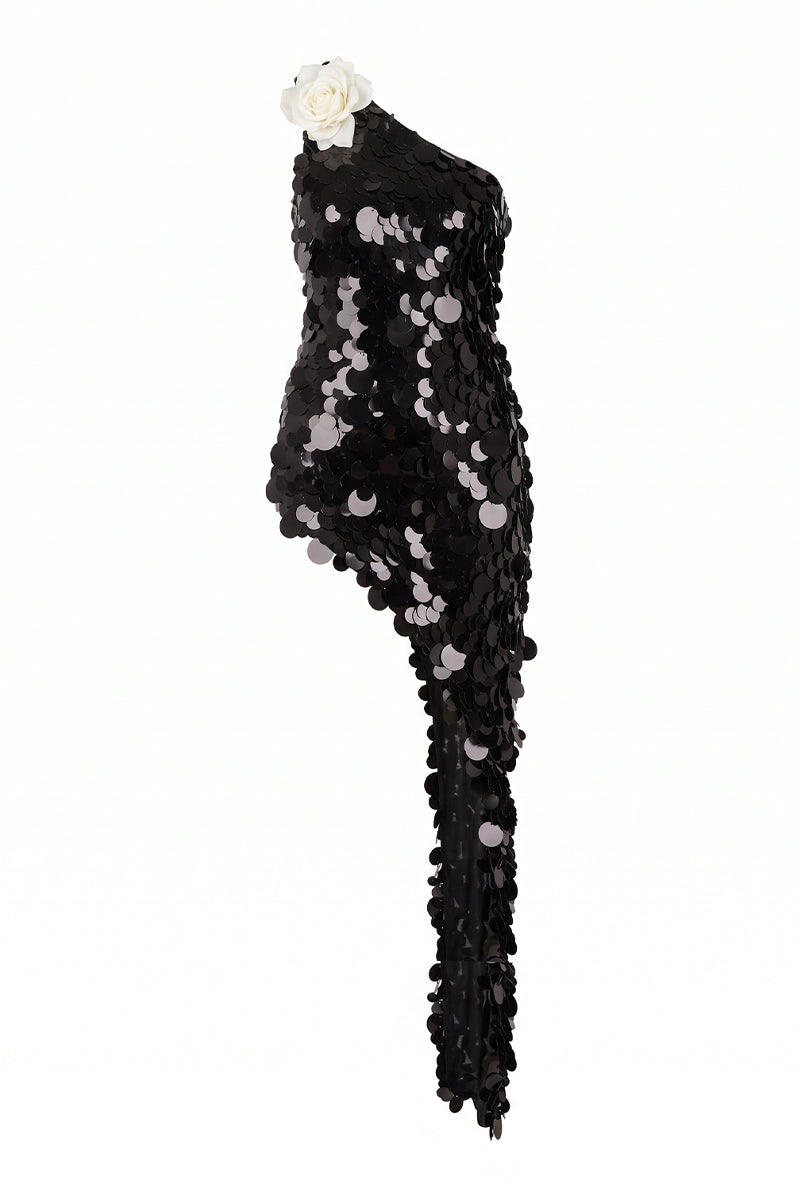 Nur Karaata Giselle Minimax gown featuring elegant fabric and detailed design, shown on a model.