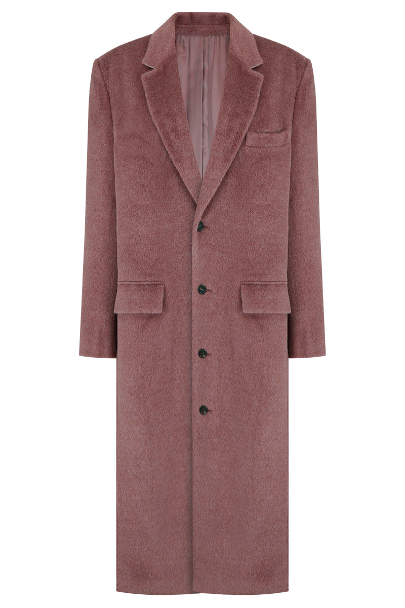 Pink oversized Suri alpaca coat by JINSUN, showing the soft, plush fabric and relaxed fit on a model.