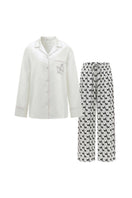 Diamond Poodles contrast silk pajama set by Not Just Pajama featuring elegant silk fabric and a stylish poodle pattern.