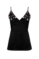 Black embroidered V-neck top by Nara Niro, featuring intricate embroidery and a stylish V-neck design.