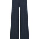 Nazlı Ceren Millie linen trousers in dark navy, showing a relaxed fit with a waistband and side pockets on a model.