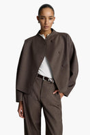 Acaria Studio Sahara Jacket in coffee color, stylish jacket with a relaxed fit, displayed on a hanger against a neutral background.