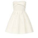 Nazlı Ceren Freya mini dress in vanilla ice color, lightweight fabric, fitted silhouette, and sleeveless design, perfect for summer.