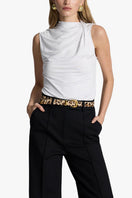 Acaria Studio leopard print leather belt with a sleek buckle, featuring bold animal pattern and durable leather strap.