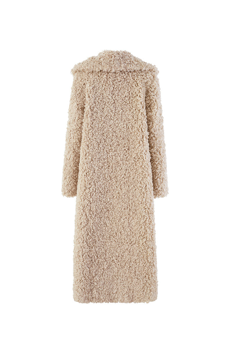 Chictopia Leona faux fur coat in soft, plush material with a stylish collar, displayed on a hanger against a neutral background.