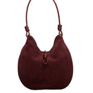 Maroon suede boho shoulder bag from Folklore The Label with a relaxed, stylish design and adjustable strap.