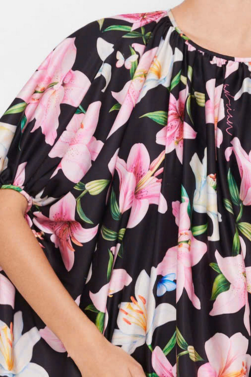 Multicolor balloon dress by Valenciani, a stylish mini dress with vibrant patterns and playful design, perfect for casual or festive occasions.