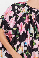 Black multicolor balloon mini dress by Valenciani with a playful, voluminous silhouette and vibrant pattern.