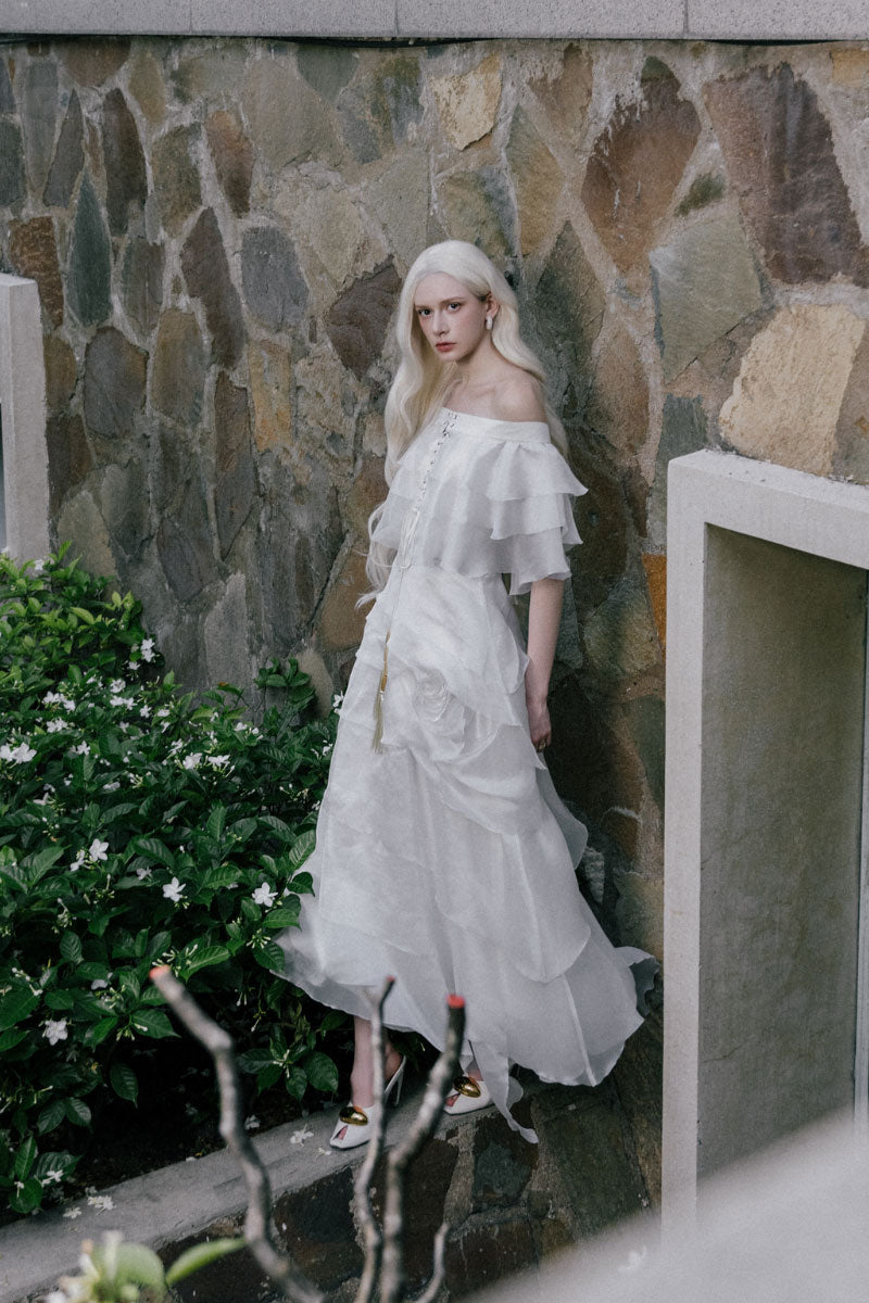 White Plan Thomas maxi dress featuring a flowing fabric and elegant design, perfect for summer or casual occasions.