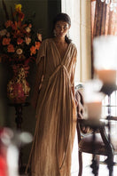 Kasia Kulenty Athena gown in sandy color, elegant maxi dress with flowing fabric and stylish design, perfect for formal occasions.