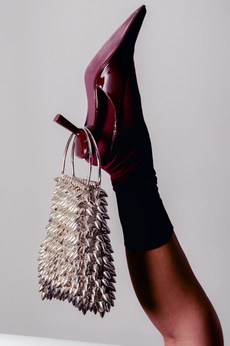 Millanne Tale IONA Silver Bag with top handle, stylish silver top handle bag showcased in the image.
