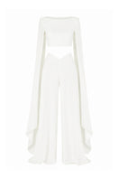 Lili Blanc sculpted wide trousers in lightweight fabric with a high waist and relaxed fit, displayed on a model.
