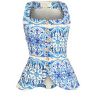 Mestiza New York Elena tailored top in Azulejo blue with a fitted design and intricate blue pattern, styled with a round neckline.