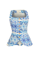 Mestiza New York Elena tailored top in Azulejo blue with a fitted design and intricate blue pattern, styled with a round neckline.