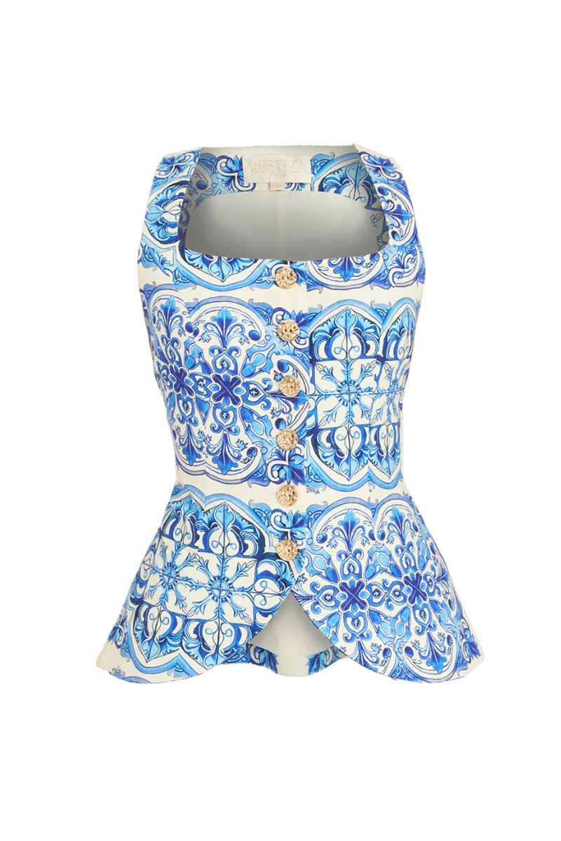 Mestiza New York Elena tailored top in Azulejo blue with a fitted design and intricate blue pattern, styled with a round neckline.