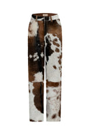 ZUT Ascot leather pants featuring a slim fit design and sleek black leather material, displayed on a hanger.